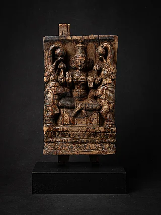 Antique wooden panel of the goddess Lakshmi