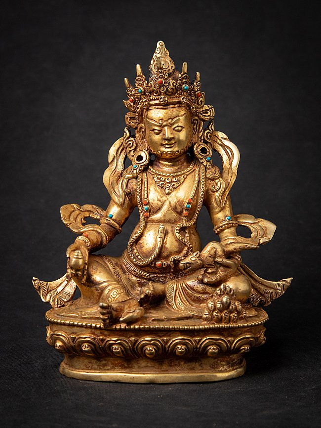 Nepali bronze Kuber statue seated on an ornate base, full front view