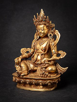 Bronze Kuber statue from Nepal with jeweled crown, three-quarter view