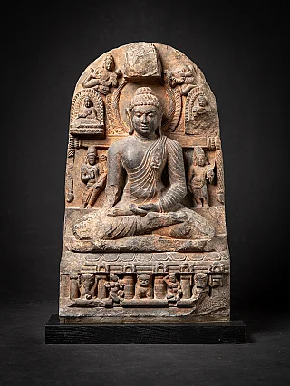 Buddha statue in Pala style from India, seated on carved base with stele, full front view