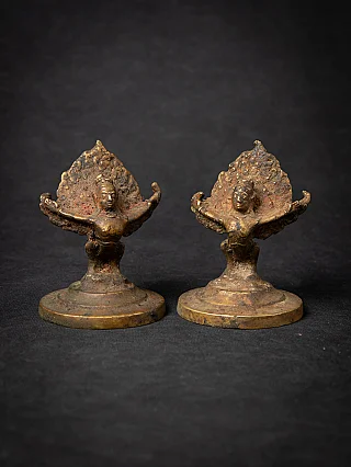 Pair of Nepali bronze Garuda statues on round bases, full front view