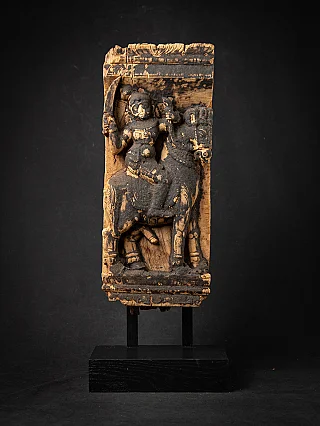 Antique wooden Indian temple panel with carved figures and animals, full front view on stand