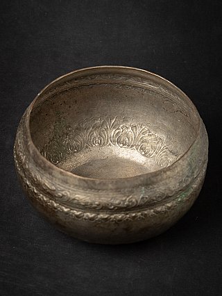 Burmese silver-plated offering bowl, angled top view showing the engraved interior