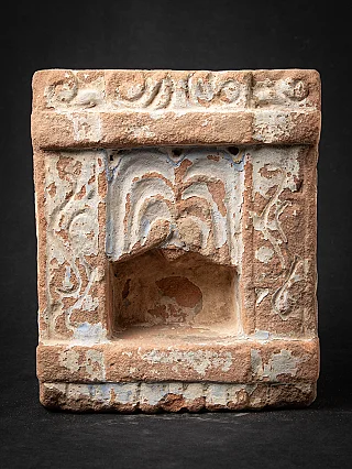 Indian stone temple shrine, full-front view with carved frame and recessed niche