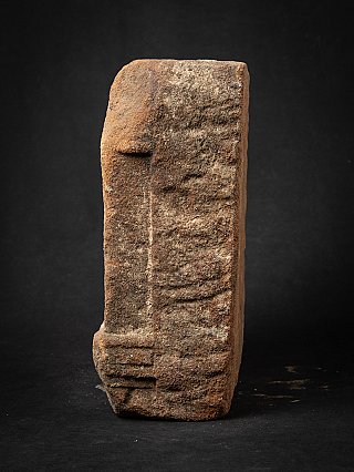 Sandstone shrine from India, right side view with rough stone surface and base edge
