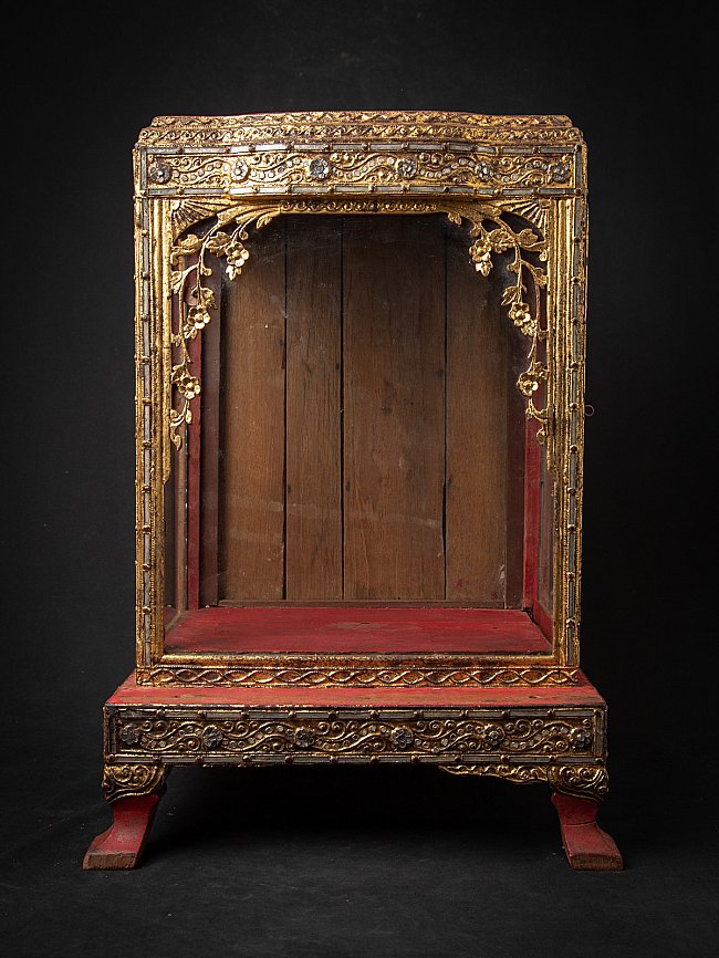 Burmese wooden Buddha shrine, full front view with gilded frame and red interior base