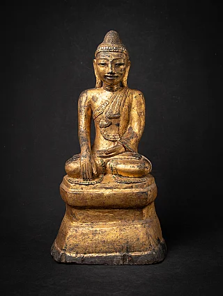 Burmese Buddha statue in lacquerware, seated in bhumisparsha mudra, full front view