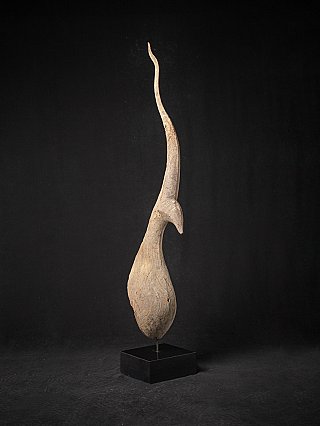 Wooden temple chofa from Thailand, side view with S-shaped finial on black stand