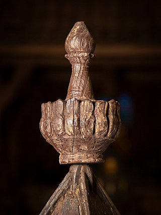 Close-up of the wooden finial mounted on the peak of the temple shrine roof
