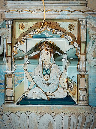 Lakshmi face and torso detail with crown and jewellery, frontal