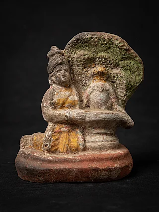 Parvaty statue from India in wood, seated on base with green back panel, full view
