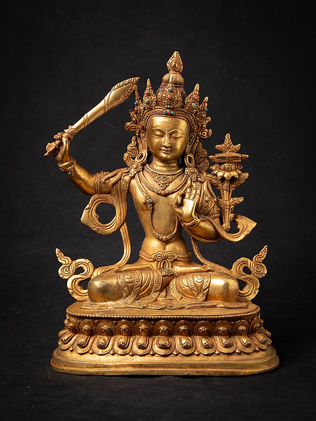 Nepali Manjushri bronze statue, full front view seated with sword and lotus stem