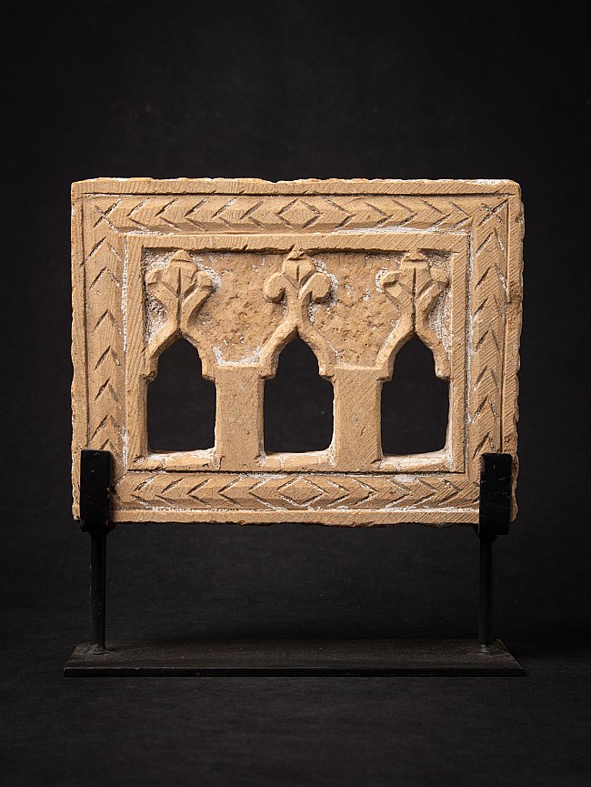 Indian temple or shrine panel on metal stand with three arched openings and incised border