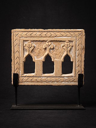 Indian temple or shrine panel on metal stand with three arched openings and incised border