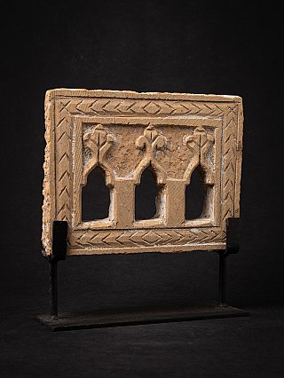 Indian shrine panel with three openings and chevron border, angled front view