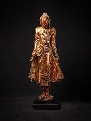 Burmese wooden Buddha statue in Mandalay style, full front view on black base