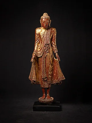 Burmese wooden Buddha statue in Mandalay style, full front view on black base