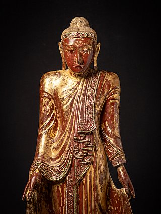 Head and torso detail of the standing Burmese Buddha, front view with inlaid headband