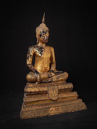Thai bronze Buddha statue on a high base, three-quarter right view with Bhumisparsha mudra
