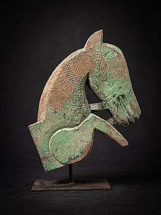 Antique wooden temple fragment of a Horse head