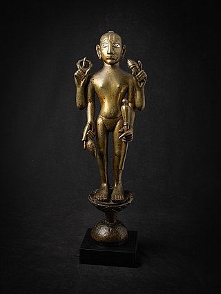 Bronze Vishnu statue from India, full frontal view on tall pedestal with four arms