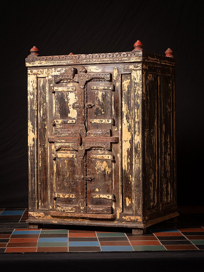 Antique 19th-century wooden Indian cabinet, three-quarter view of the front with iron hardware