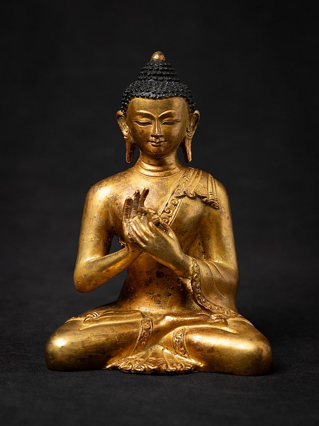Old bronze Nepali Buddha statue