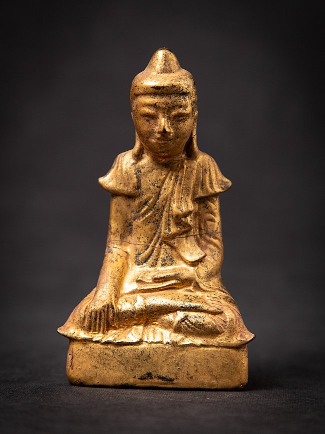 Wooden Burmese Buddha statue in Shan style, seated in bhumisparsha mudra, front view