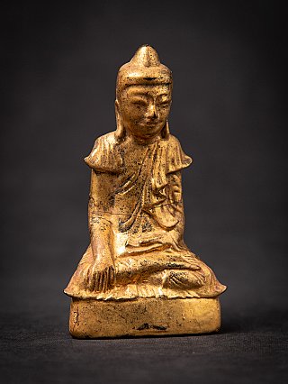 Shan-style Burmese Buddha statue in wood, seated with right hand down, slight angle