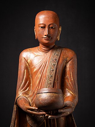 Antique wooden Burmese Monk statue