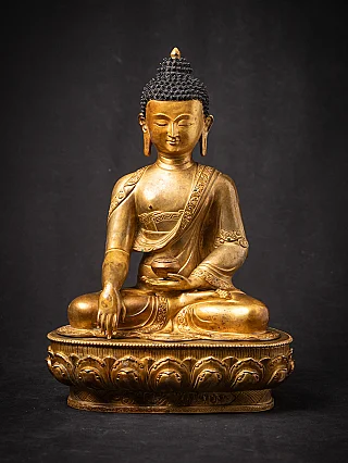 Bronze Buddha statue from Nepal seated in bhumisparsha mudra, full front view