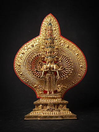Avalokiteshvara statue in bronze from Nepal, standing with many arms and large aureole, front view