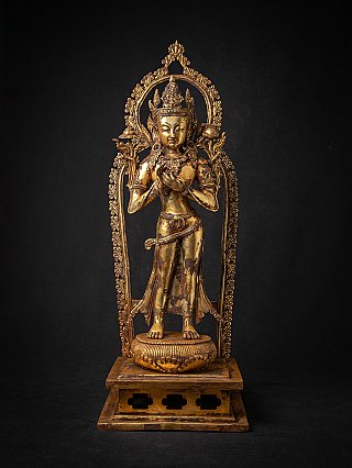 Bodhisattva statue in bronze from Nepal, standing in dharmachakra mudra, full front with halo