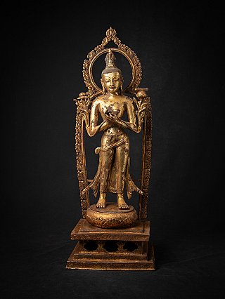 Nepali bronze Bodhisattva statue standing on a tiered base with aureole, full front view