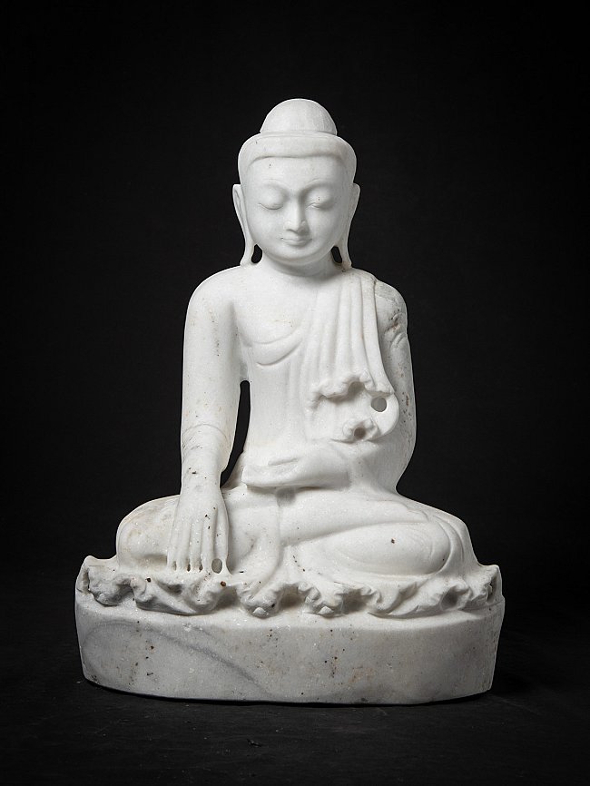 Old marble Burmese Mandalay Buddha