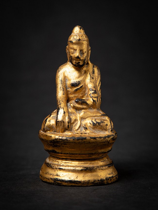 Antike holzerne Burmesische Buddhafigur