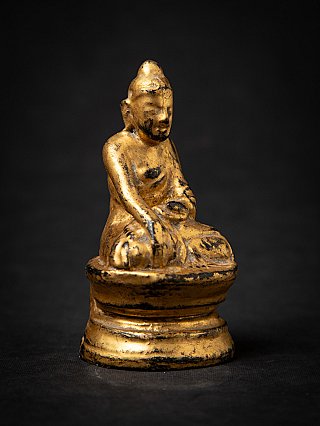 Antike holzerne Burmesische Buddhafigur