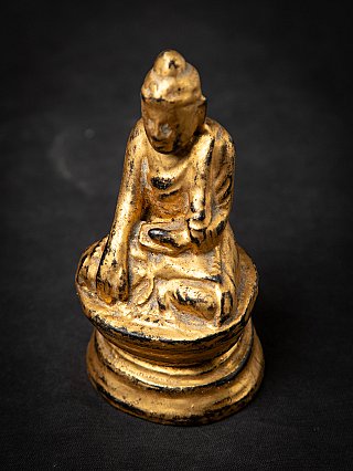 Antike holzerne Burmesische Buddhafigur