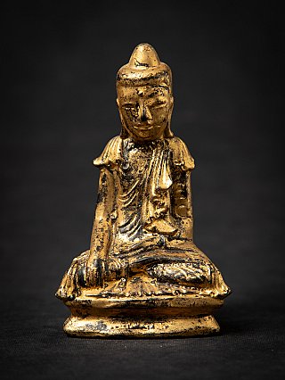 Burmese wooden Buddha statue seated in bhumisparsha mudra, full front view