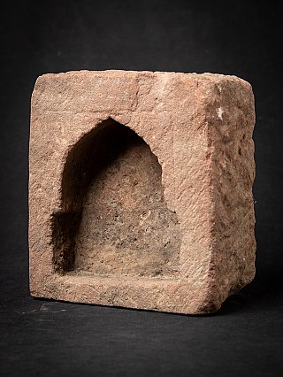 Indian temple niche, three-quarter view showing the deep arched recess