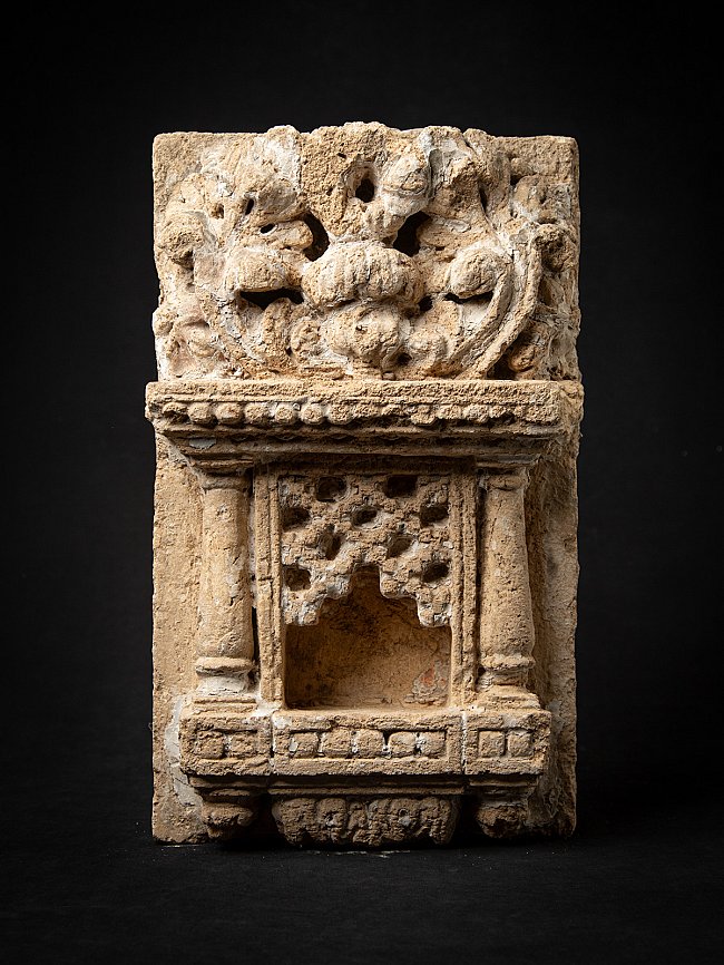 Indian temple or shrine stone with niche and pilasters, full front view