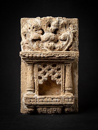 Indian temple or shrine stone with niche and pilasters, full front view