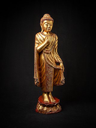 Old wooden Burmese Buddha statue