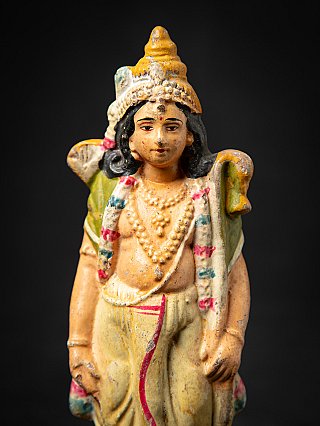 Rama statue face and chest detail, front view
