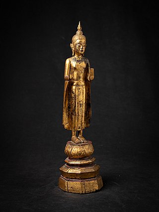 Antique wooden Thai Buddha statue