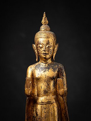 Antique wooden Thai Buddha statue