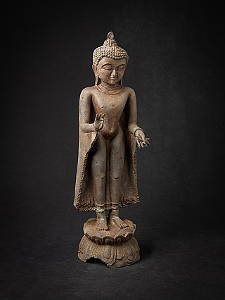 Burmese bronze Buddha statue in a slightly angled front view, standing with vitarka mudra