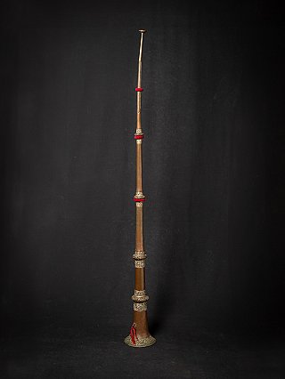 Tibetan copper dungchen horn, full view standing upright with decorative bands