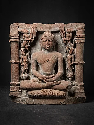 Jina statue relief from India, full front view with flanking pillars and attendants