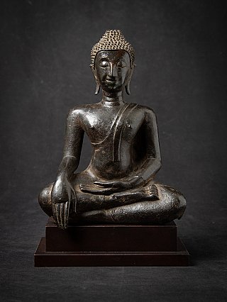 Antique Thai bronze Buddha statue, full front view seated in bhumisparsha mudra on wooden base